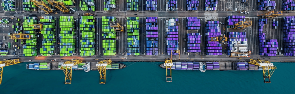 Realistic depiction of modern port operations in Saudi Arabia, featuring container terminals with AI-driven data overlays, smart cargo movement, and dynamic resource allocation.